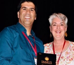 Sharad Kohli accepts award for his exceptional service to IM4US
