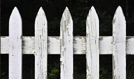 Old white picket fence